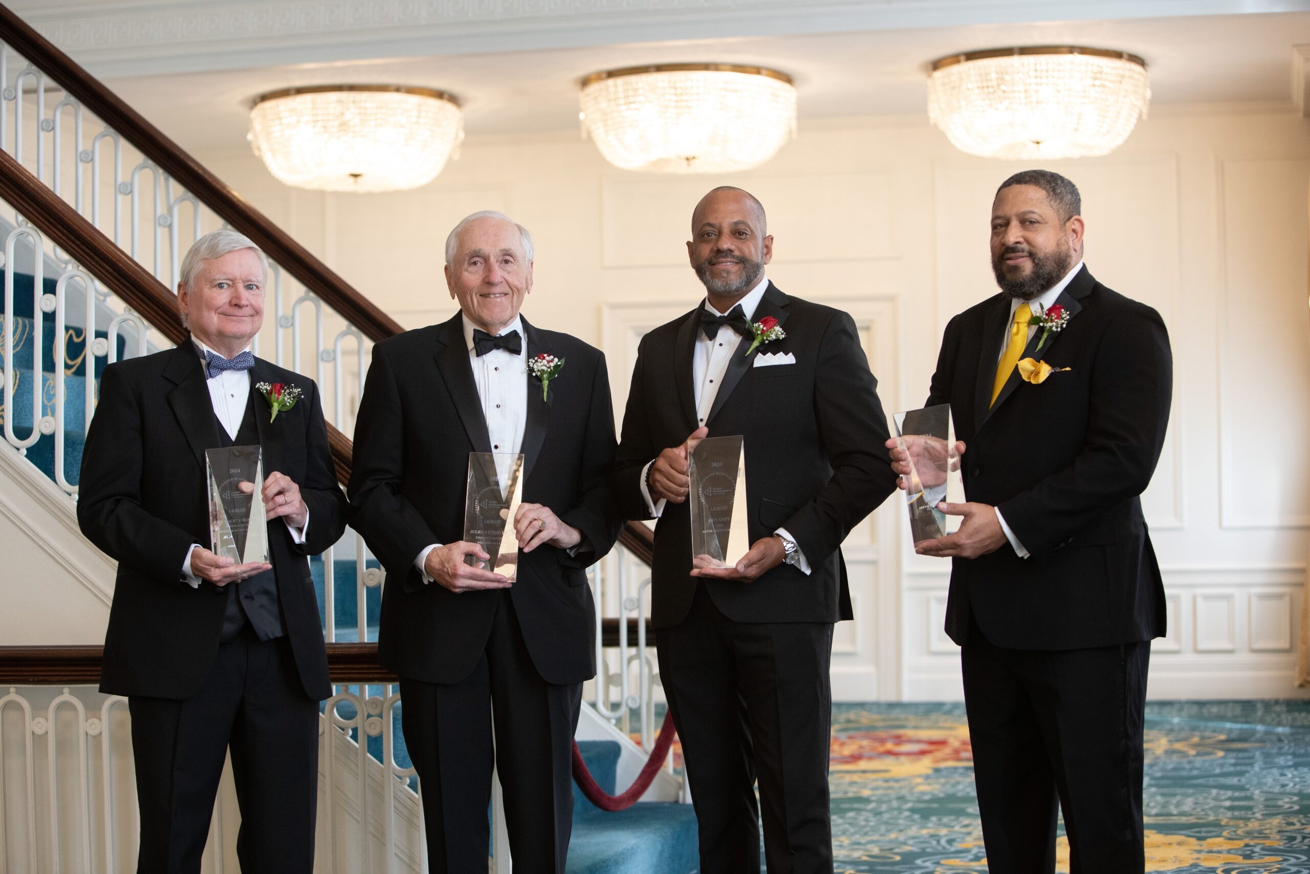 Photo of Ken and Same being inducted into the Junior Achievement Business Hall of Fame